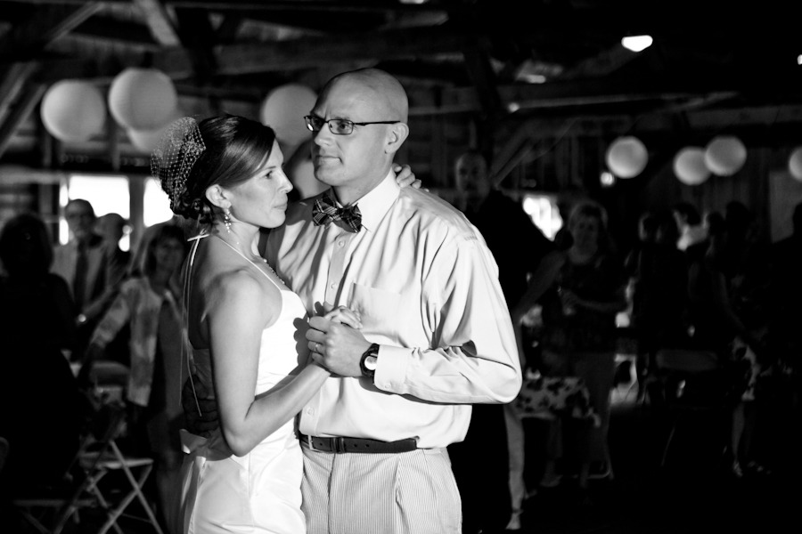 black and white photo of a bride and groom dancing
