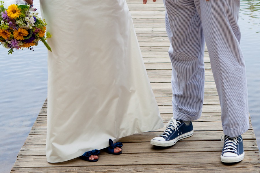 portrait of the bottom half of a bride and groom