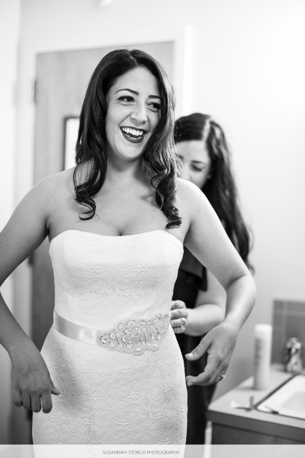 black and white image of a bride getting ready for her wedding