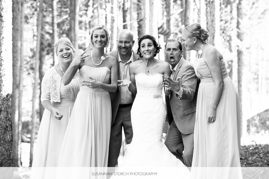 black and white photo of a bride and some members of her bridal party