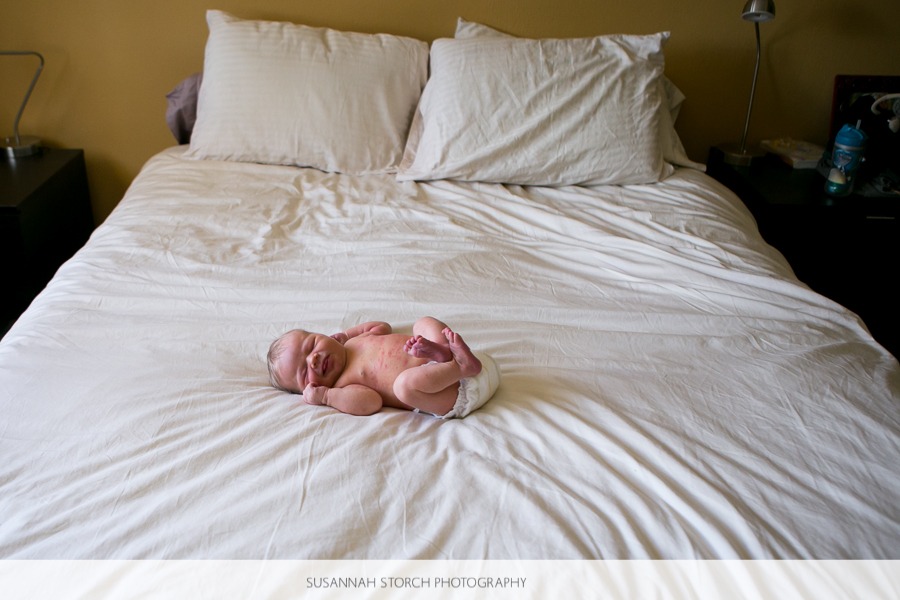 boulder-newborn-photography-of-baby-on-bed