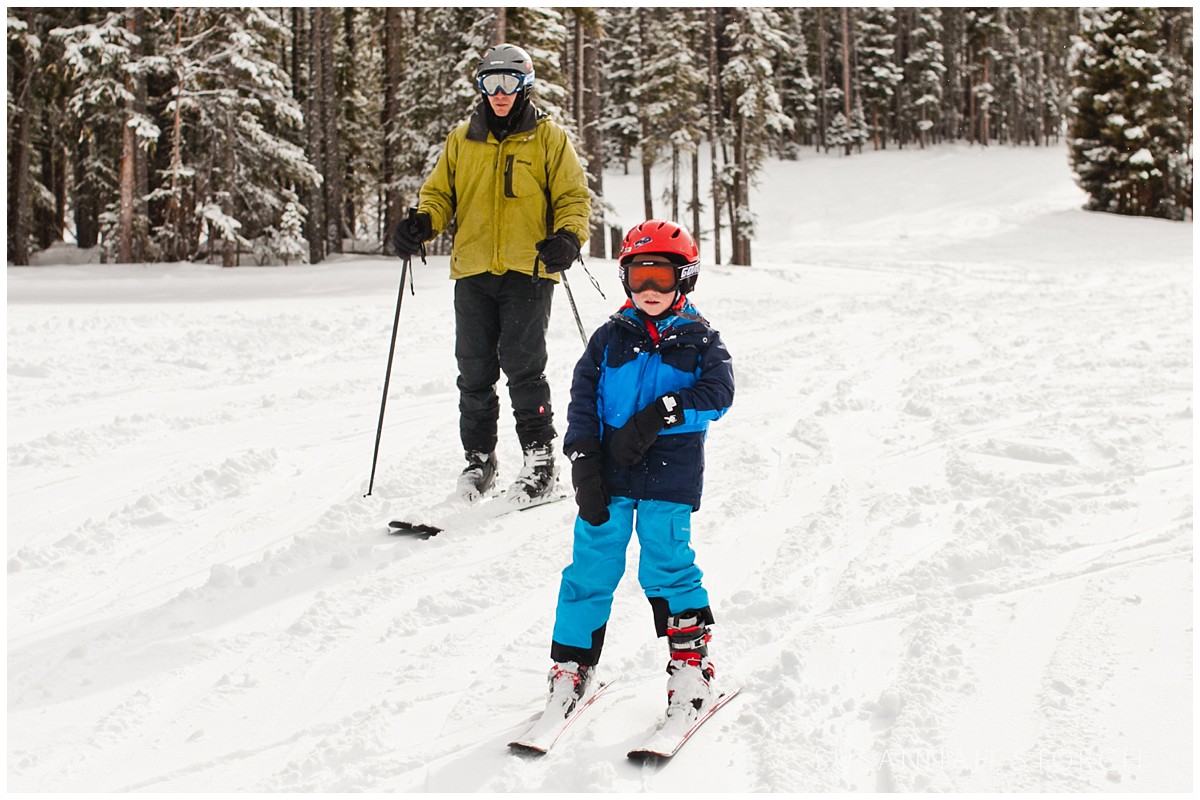 a boy and his dad ski