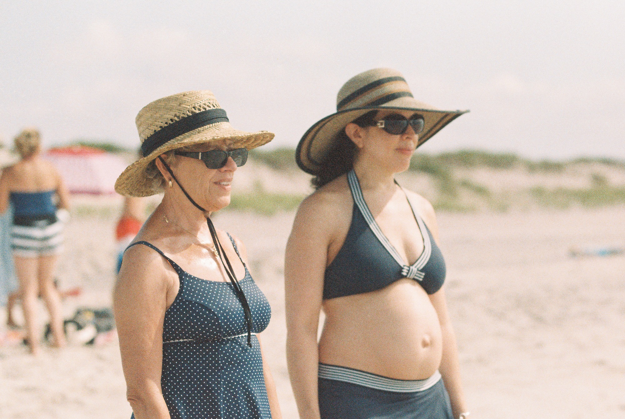 Film scan of two women looking out towards the ocean on New York's Fire Island