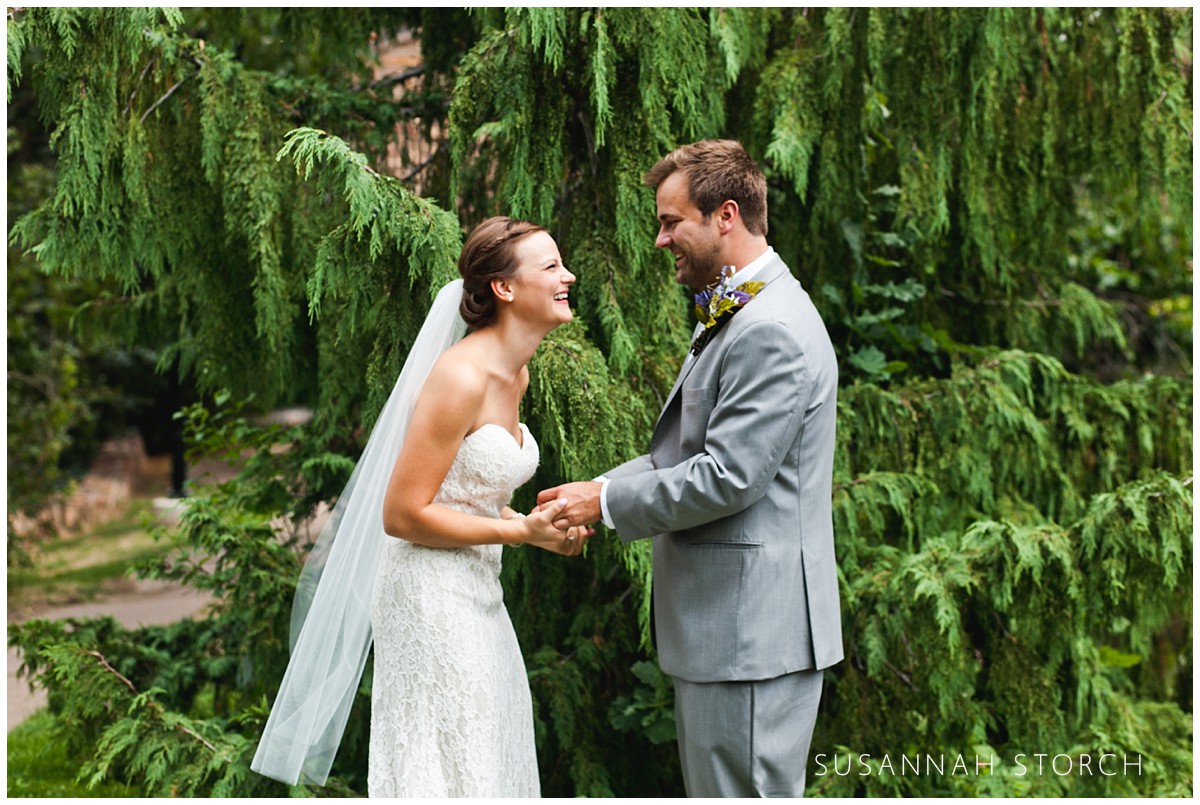 wedding couple portrait in front of trees