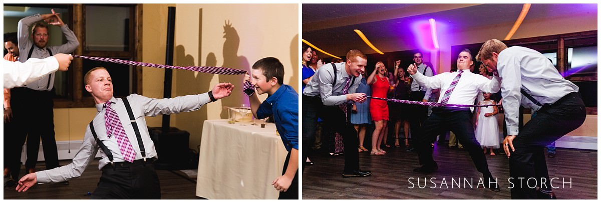 wedding guests do the limbo during a lodge at breck reception