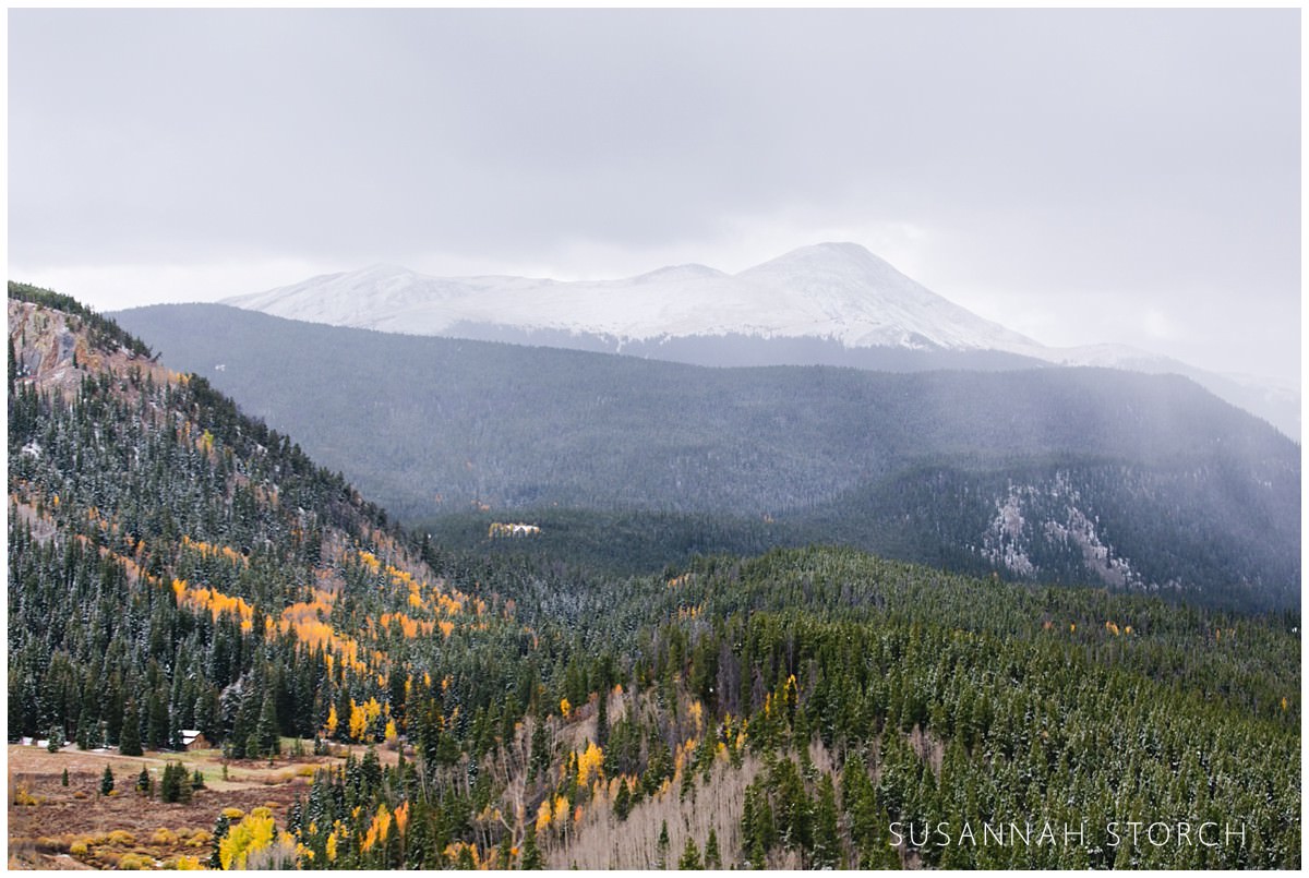 a fall landscape with snow in the mountains of breckenridge, colorado