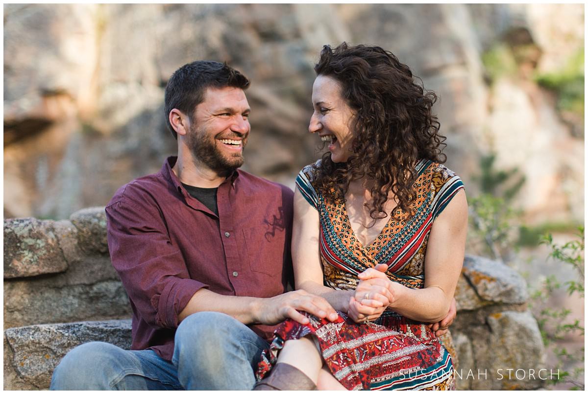 colorado engagement photos featuring a laughing couple