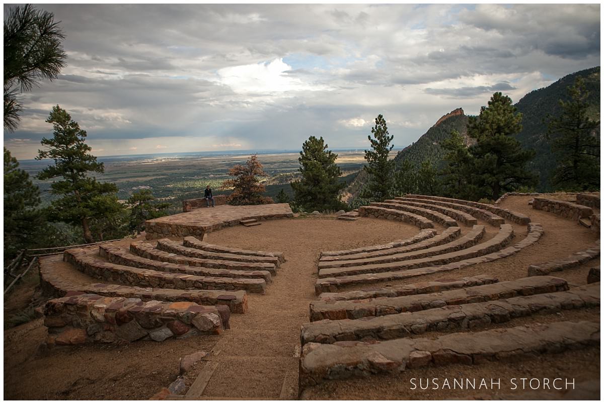 colorado senior photography of a client at the sunrise amphitheater in boulder