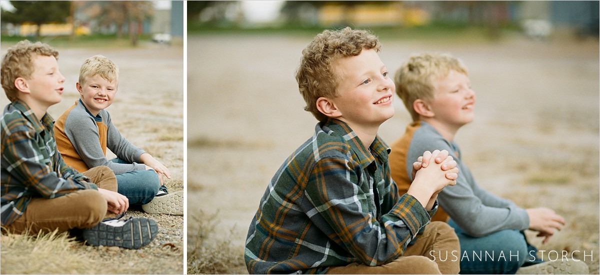 images of brothers sitting on the ground