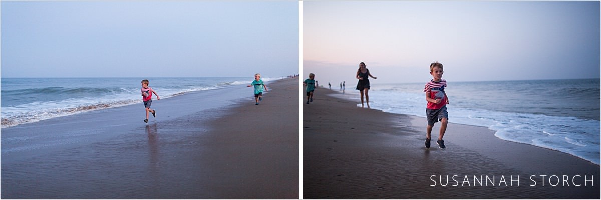 boys run on the beach at dusk