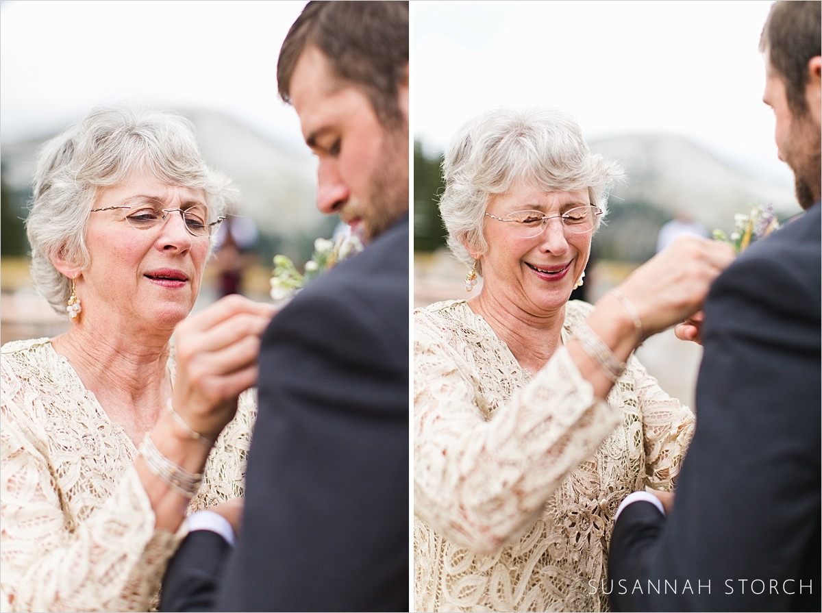 mother of groom helps her son get ready for his colorado mountain wedding