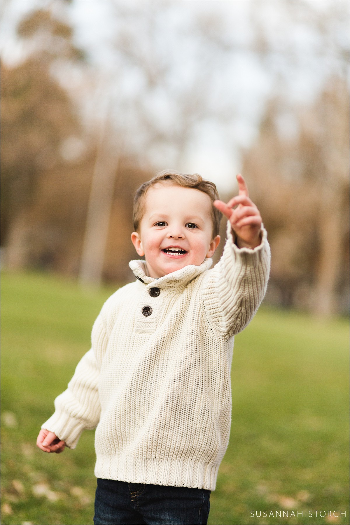 happy toddler boy during a fall photoshoot