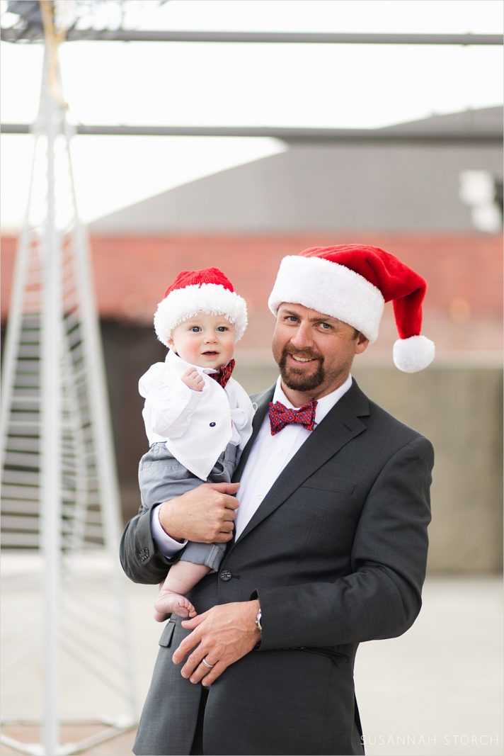 relaxed dad and baby in an outdoor courtyard during a photo session