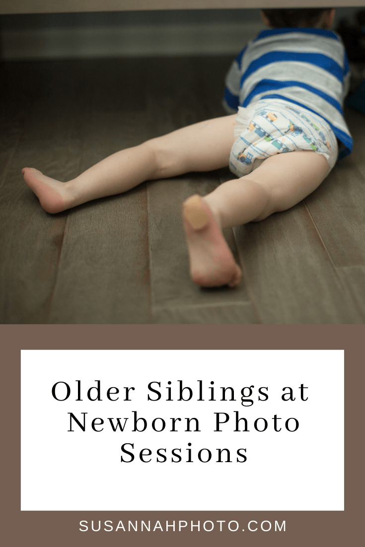 Older siblings at newborn photo sessions