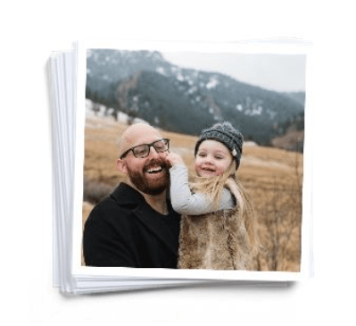 stack of 5x5 photos with a daughter poking her dad
