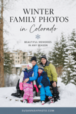 Family sitting together in the snow during a winter family photo session in Colorado.