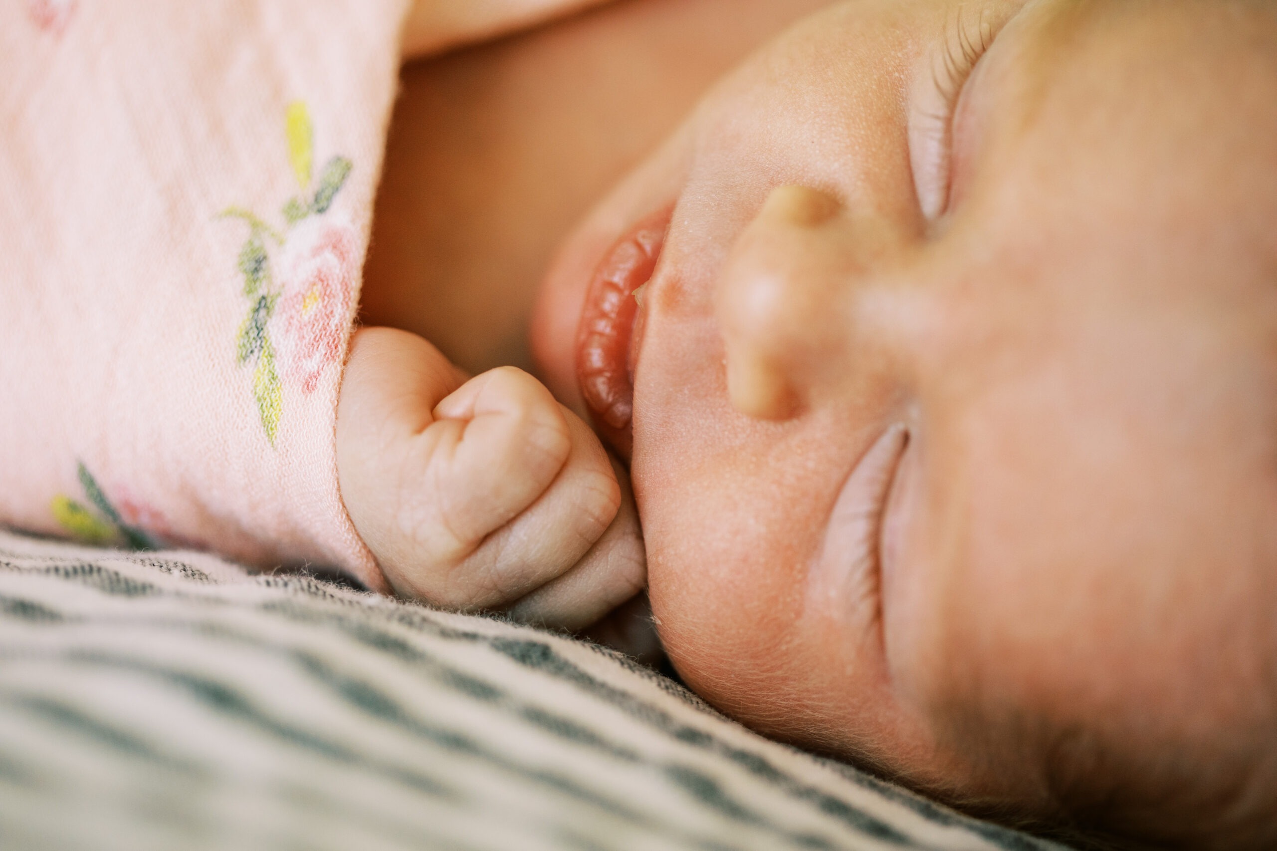 detail of a newborn baby girl's face