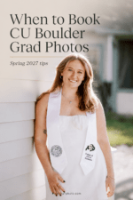 CU Boulder graduate in a white dress and graduation stole smiling beside a light-colored wall with text overlay about when to book grad photos.