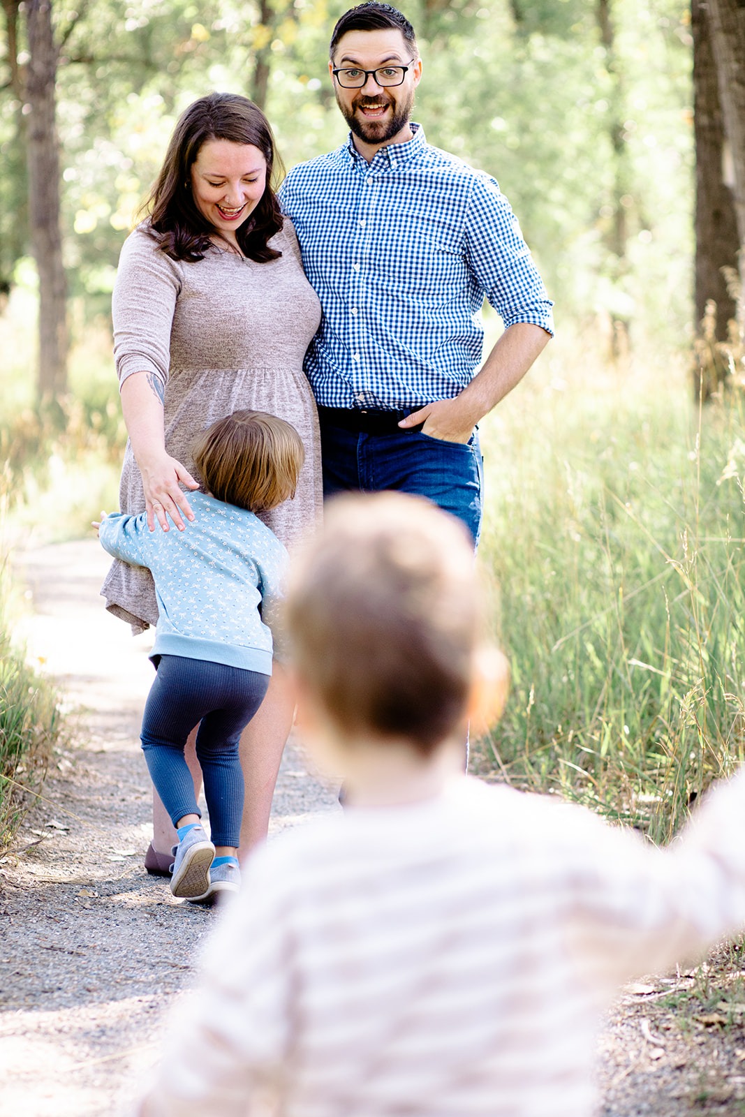 family interacting naturally during spring photo session in Longmont Colorado