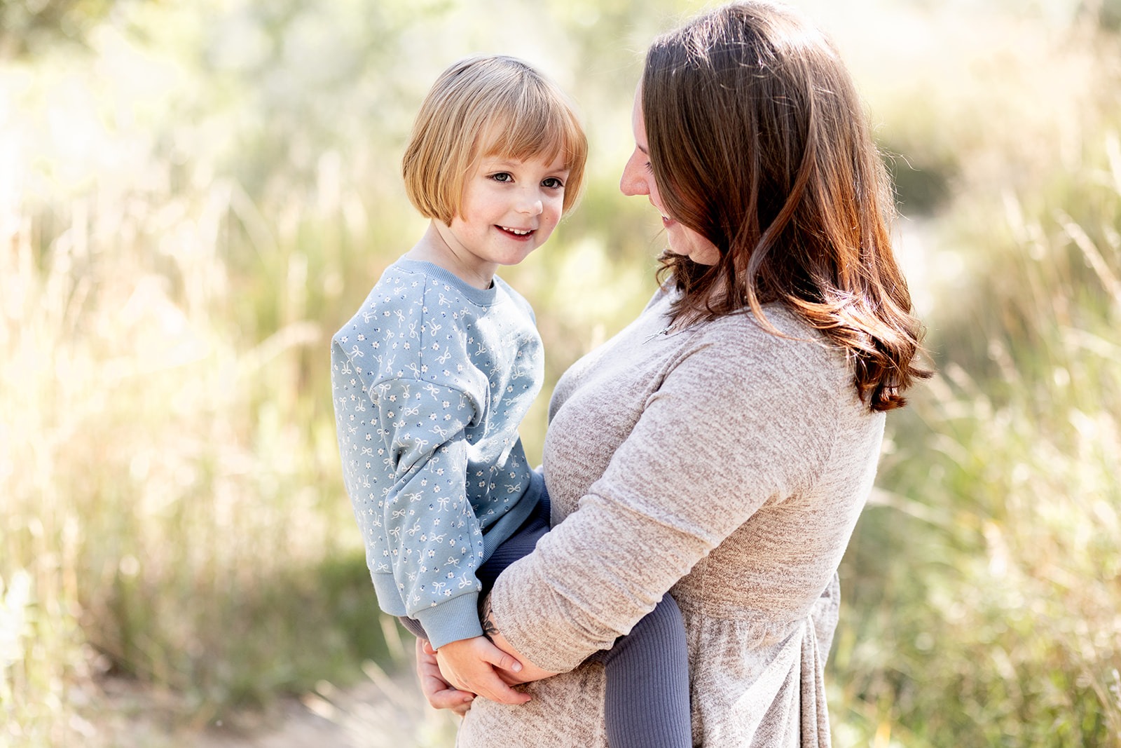 Natural light mini session with mom looking at daughter in Longmont, CO