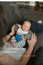 Newborn baby boy resting on grandparent's lap during in-home lifestyle session in Erie, Colorado