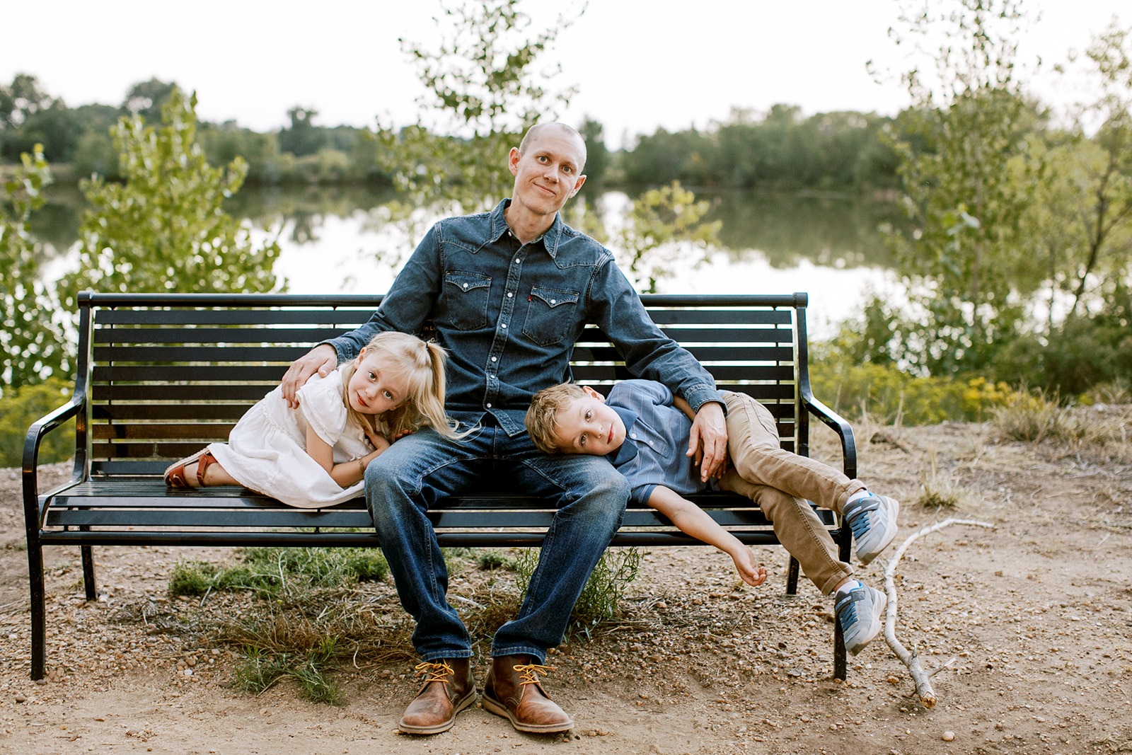 loveland family portrait with kids and dad sitting on bench
