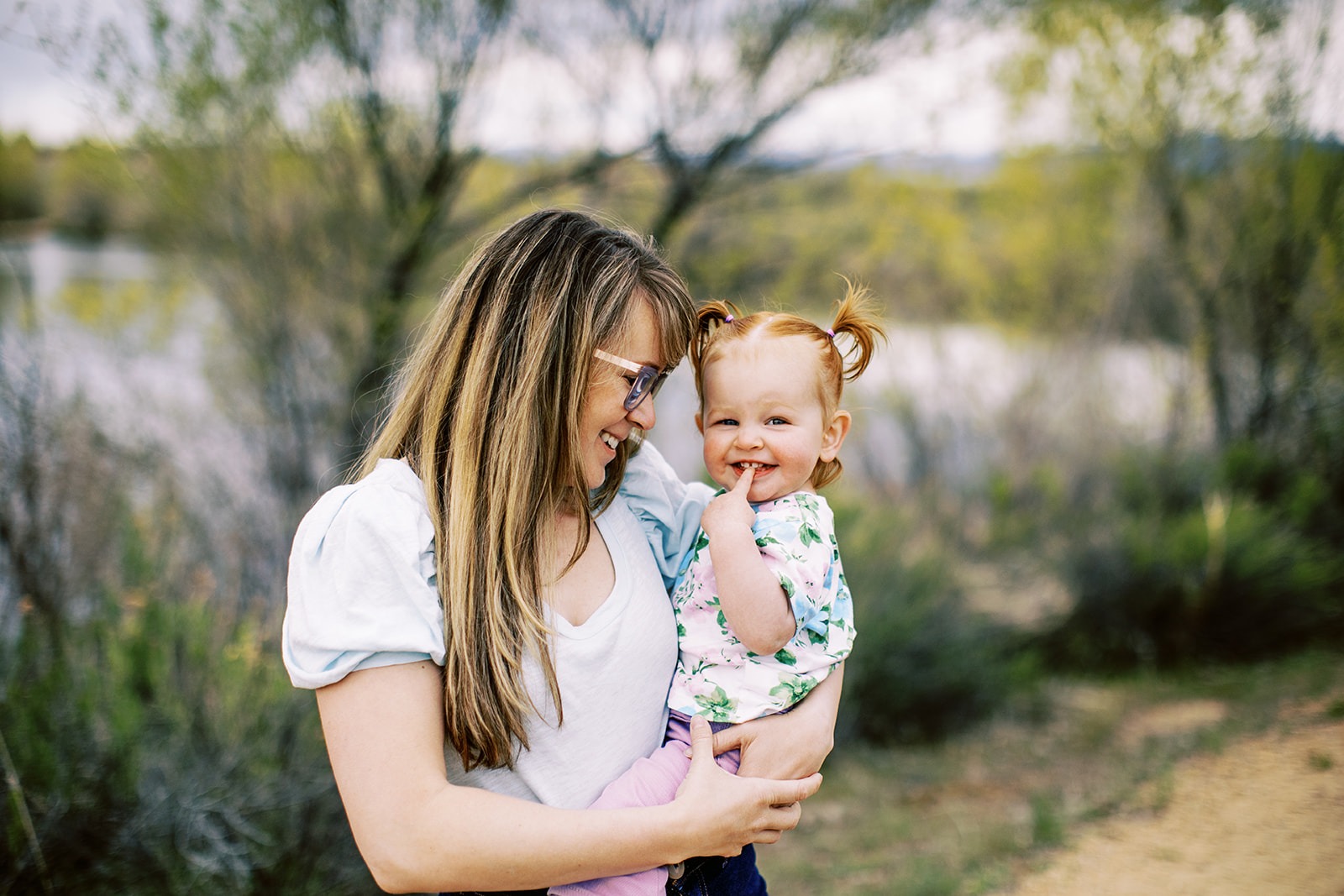 mom looks at daughter during loveland colorado family photography