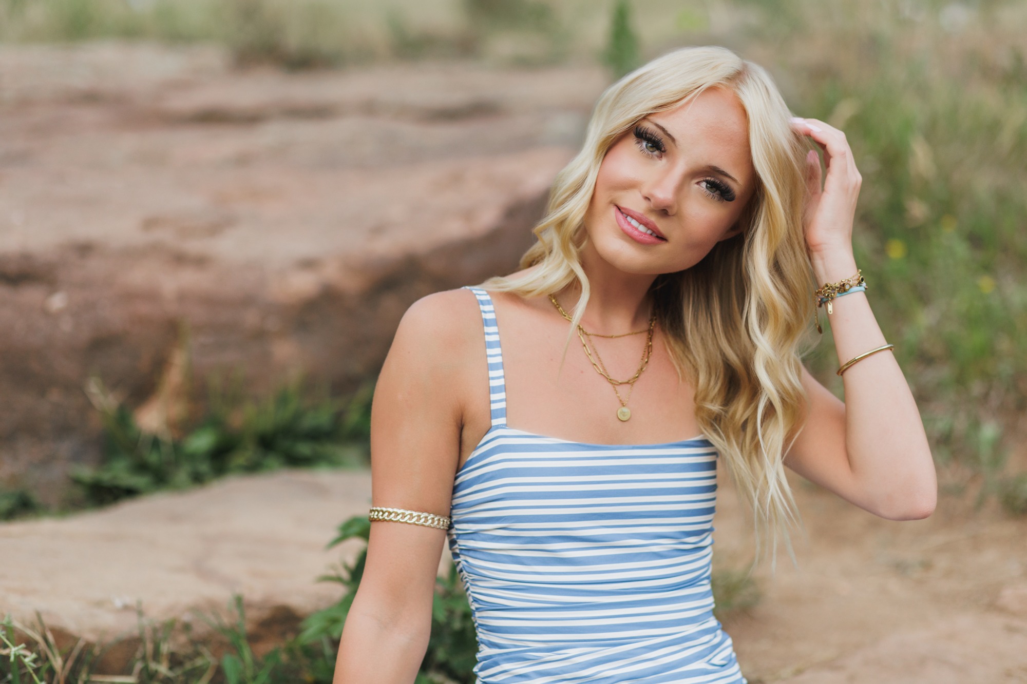 high school senior poses for boulder senior photos at chautauqua park