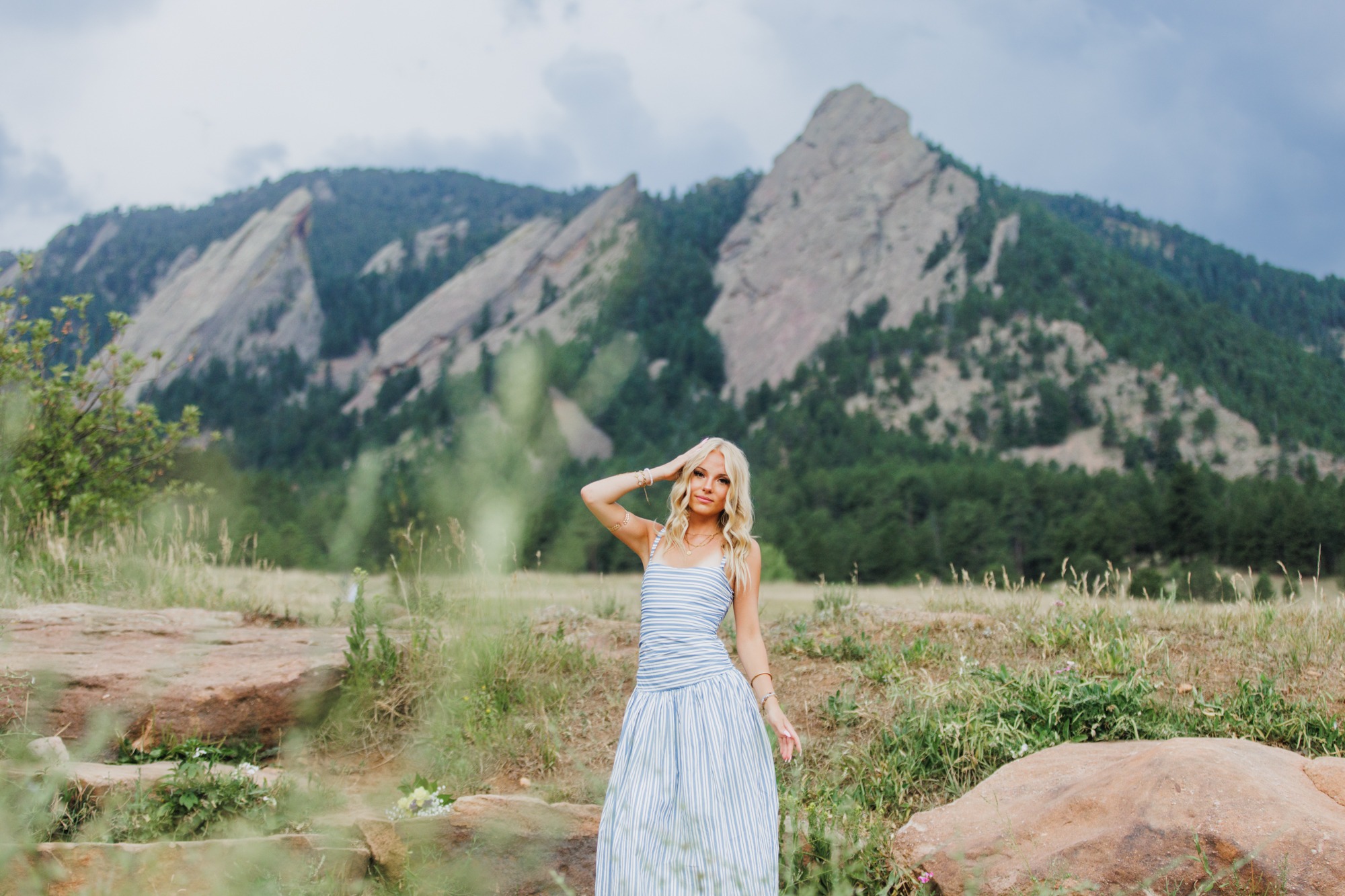 Boulder senior portrait in front of Flatirons