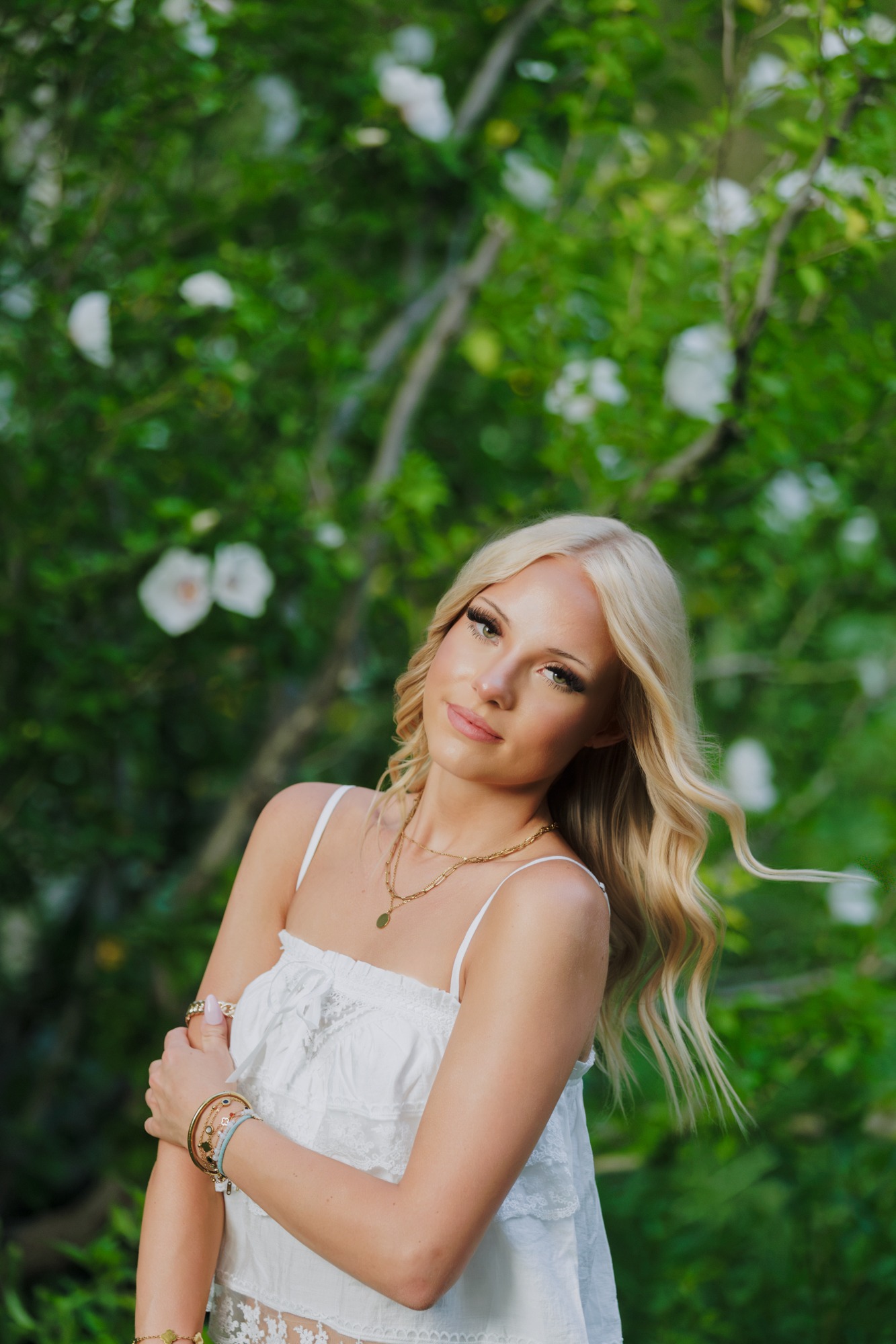 boulder senior photography in front of green tree at chautauqua